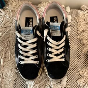 Golden Goose Black and White Superstar Sneakers
